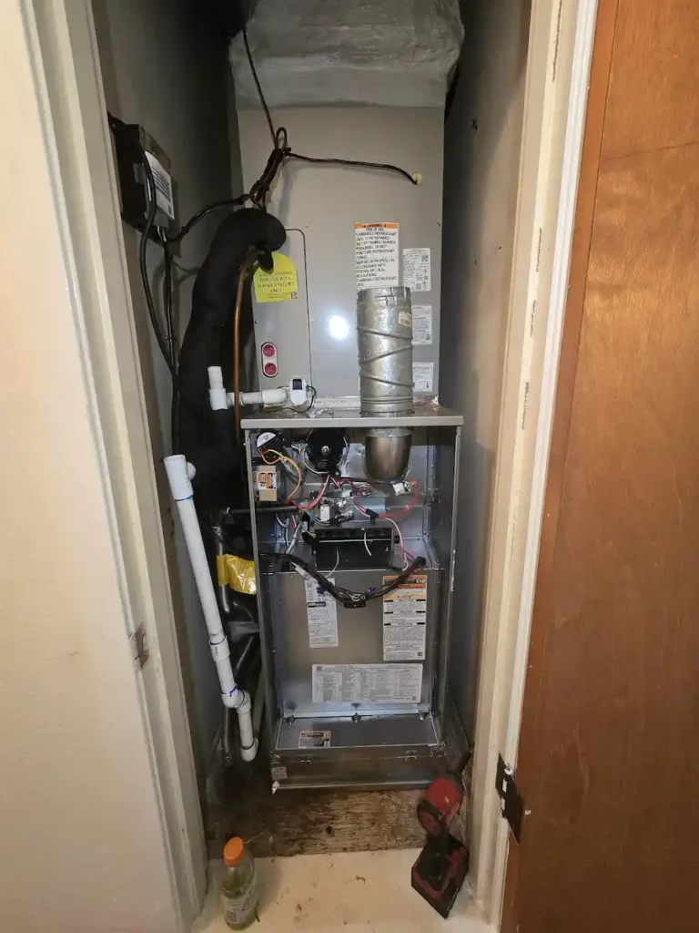 Certified HVAC technician performing a heating diagnostic in San Antonio