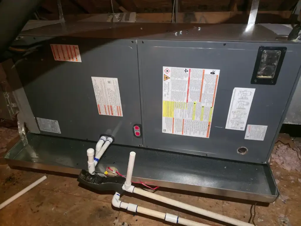 E-MAX HVAC technician performing a professional residential heat pump installation in San Antonio, TX