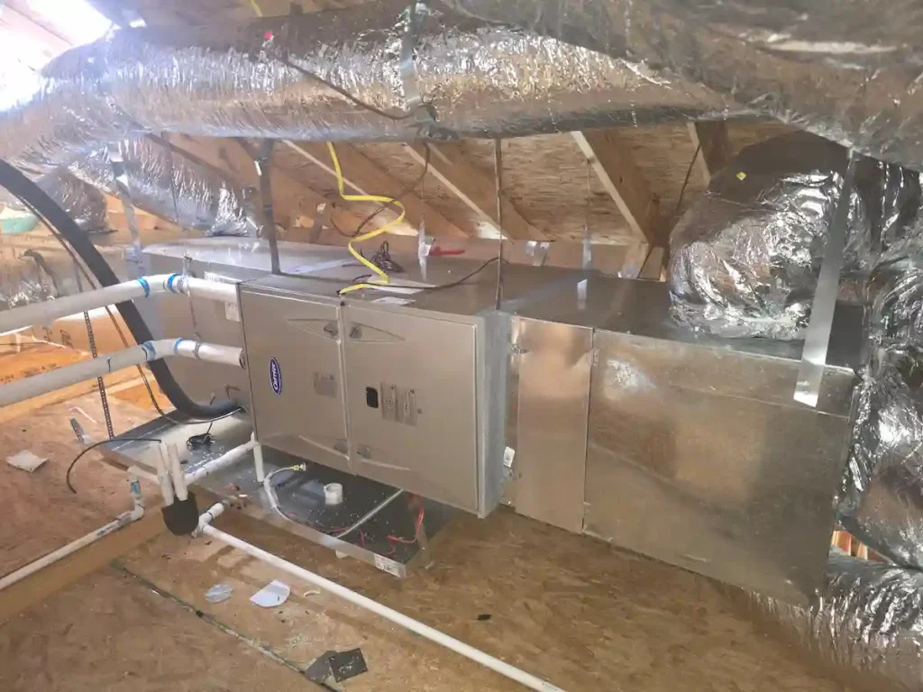 EMAX HVAC technician performing a professional furnace installation in San Antonio, Texas