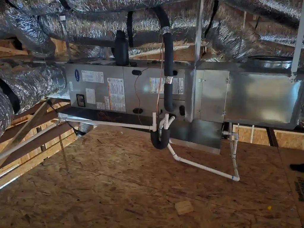Expert contractor performing a central AC installation and ductwork setup in Texas